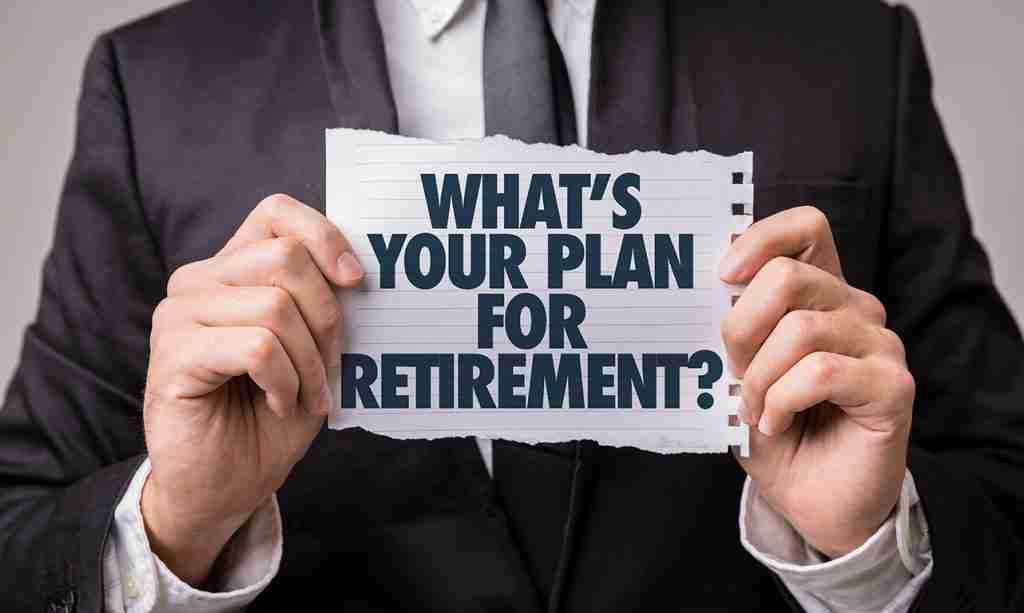 What's Your Plan for Retirement sign held by business man